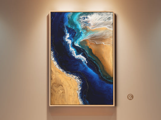 Framed fluid art ocean print in a coastal style. The abstract beach canvas art features deep blue and sandy gold tones. Perfect modern home decor for beach lovers. The artwork captures ocean waves and the shoreline. This piece enhances any room with coastal charm. It's a unique gift for those who appreciate ocean-inspired art.