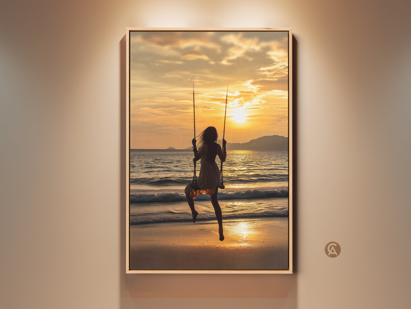 Coastal boho wall art featuring a woman on a swing at sunset. Golden orange ocean waves create a serene beach scene. The artwork is a canvas print perfect for adding a touch of summer vacation to your home decor. A beautiful residential ocean view art piece.