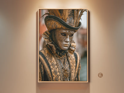 Ornate Venetian Mask canvas print. A baroque costume artwork featuring a gold and black color palette. This eclectic wall decor brings a masquerade festival feel to any space. Feather accents add a touch of luxury. A captivating gift for art and costume enthusiasts.