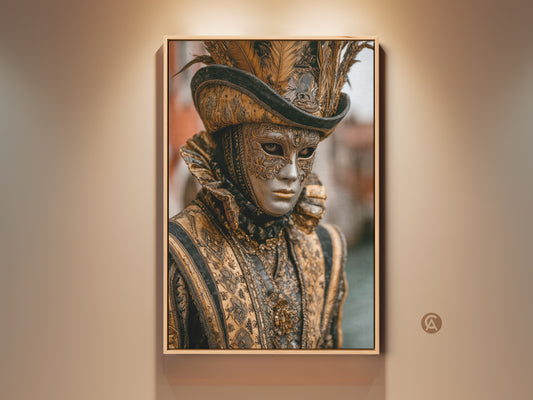 Ornate Venetian Mask canvas print. A baroque costume artwork featuring a gold and black color palette. This eclectic wall decor brings a masquerade festival feel to any space. Feather accents add a touch of luxury. A captivating gift for art and costume enthusiasts.