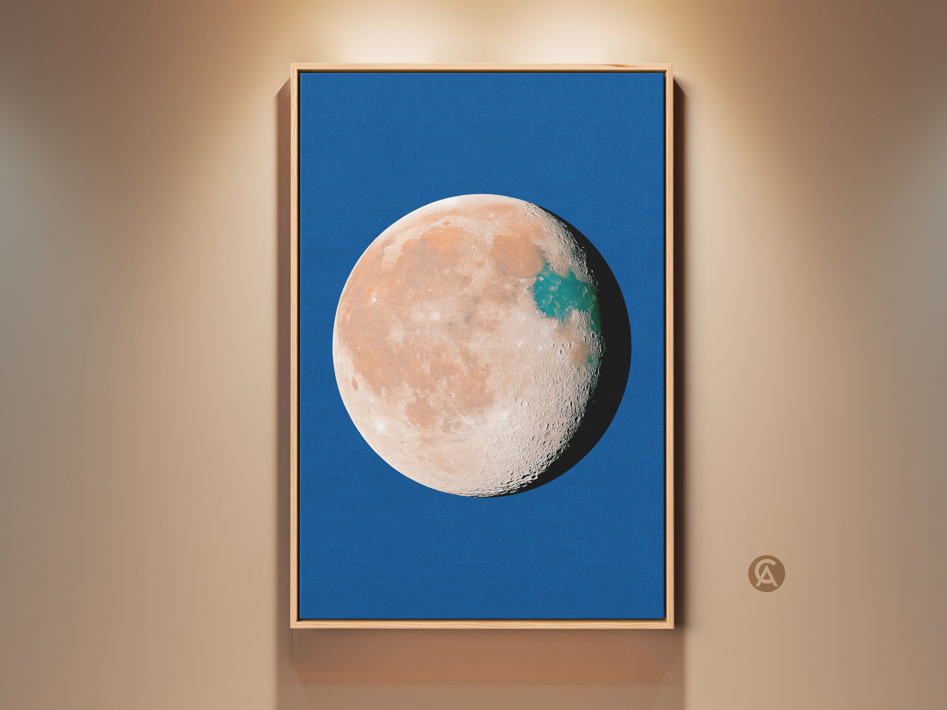 Abstract planet art print in a wood frame. This celestial moon decor features a blue background. The orange and teal space wall art has a surreal minimalist bedroom art style. Makes a great gift idea.