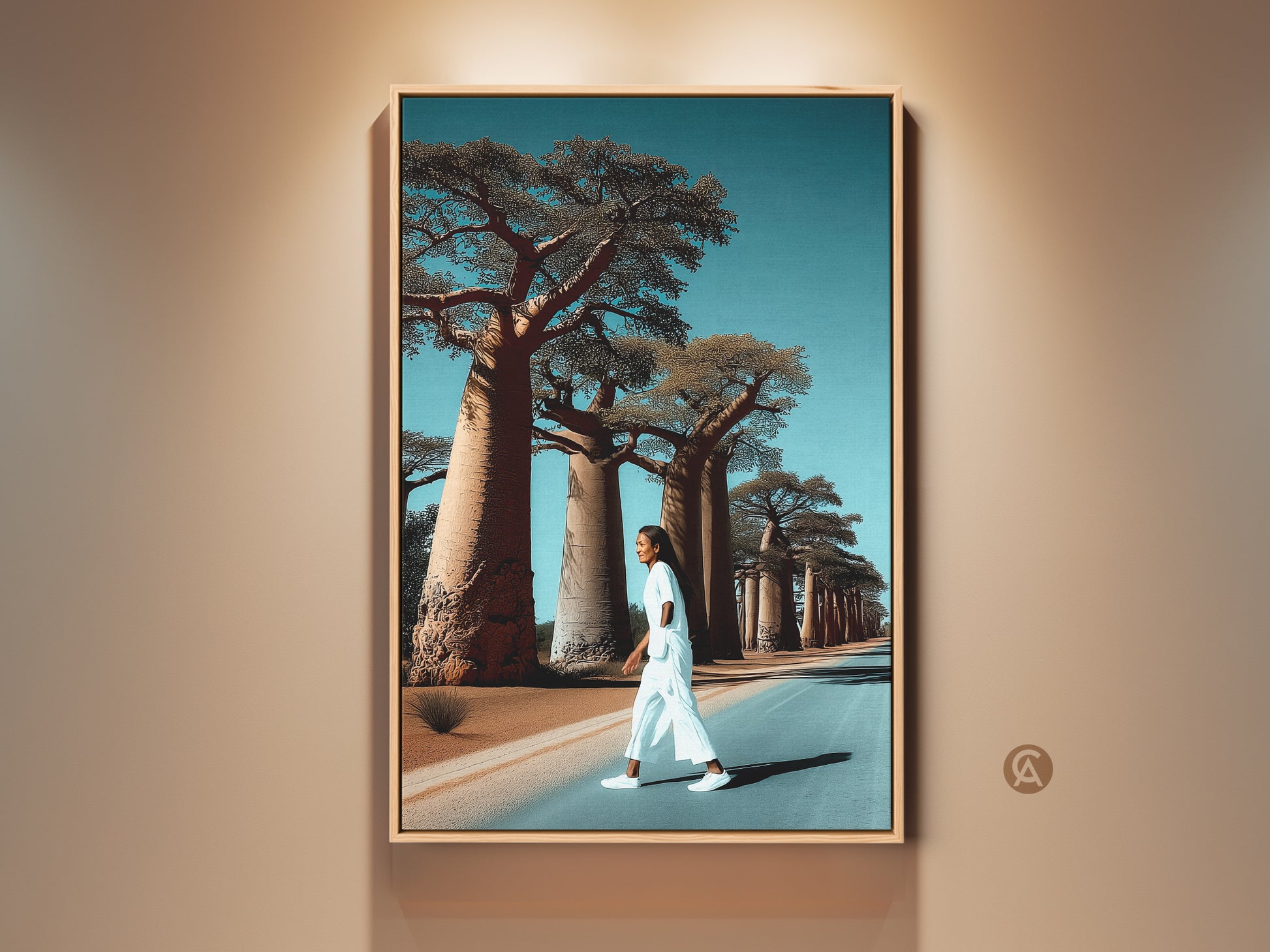 Realistic Baobab tree art print inside a oak floating frame. A woman walks a lonely road. This African landscape canvas art brings boho travel decor to any entry hall. The teal and blue tones create vacation vibes. It is a unique housewarming gift idea.