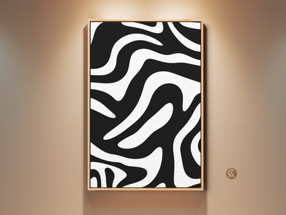 Gallery shot of a framed minimalist black and white zebra art print. The abstract wavy lines canvas creates a modern pattern. This contemporary decor piece is perfect for chic wall decor.