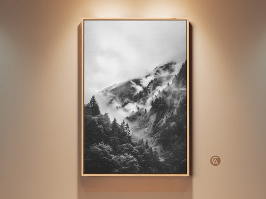Framed foggy mountain forest canvas print. It's a monochrome landscape wall art piece. The black and white nature scene adds modern home accent. Perfect housewarming gift art.