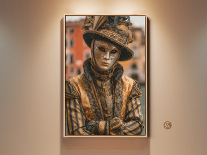 Framed Venice Carnival Mask artwork. The artwork features a person wearing a traditional gold mask and costume. It adds an elegant touch to any room. A great conversation starter and a beautiful piece of art.