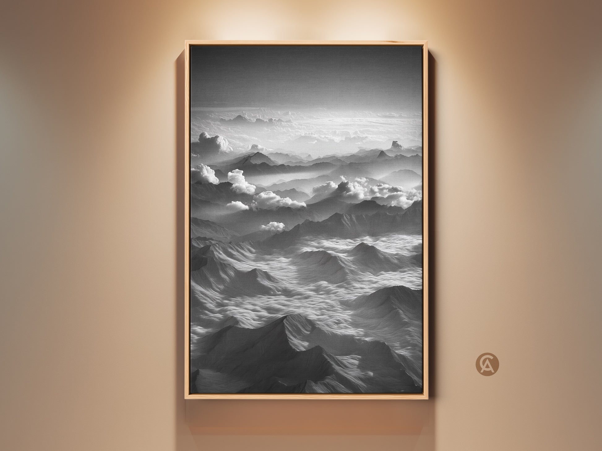 Framed aerial mountain canvas art in black and white. It is a minimalist cloudscape wall decor piece. This contemporary nature artwork features a black frame. Perfect modern home office art.