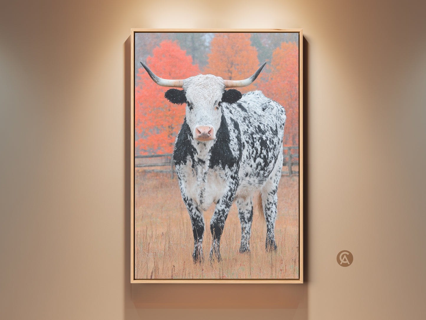 Explore Longhorn Cow artwork. The framed art shows a black and white speckled Longhorn. The majestic animal stands in a field. Behind it are autumn colored trees. Get yours now