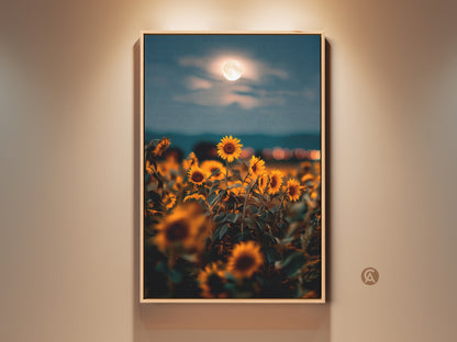 Boho sunflower moon canvas art in a floating frame. The artwork features a golden yellow and orange sunflower field under a full moon. This dreamy print adds warmth to any room and is perfect as a housewarming gift or a special present for grandma.