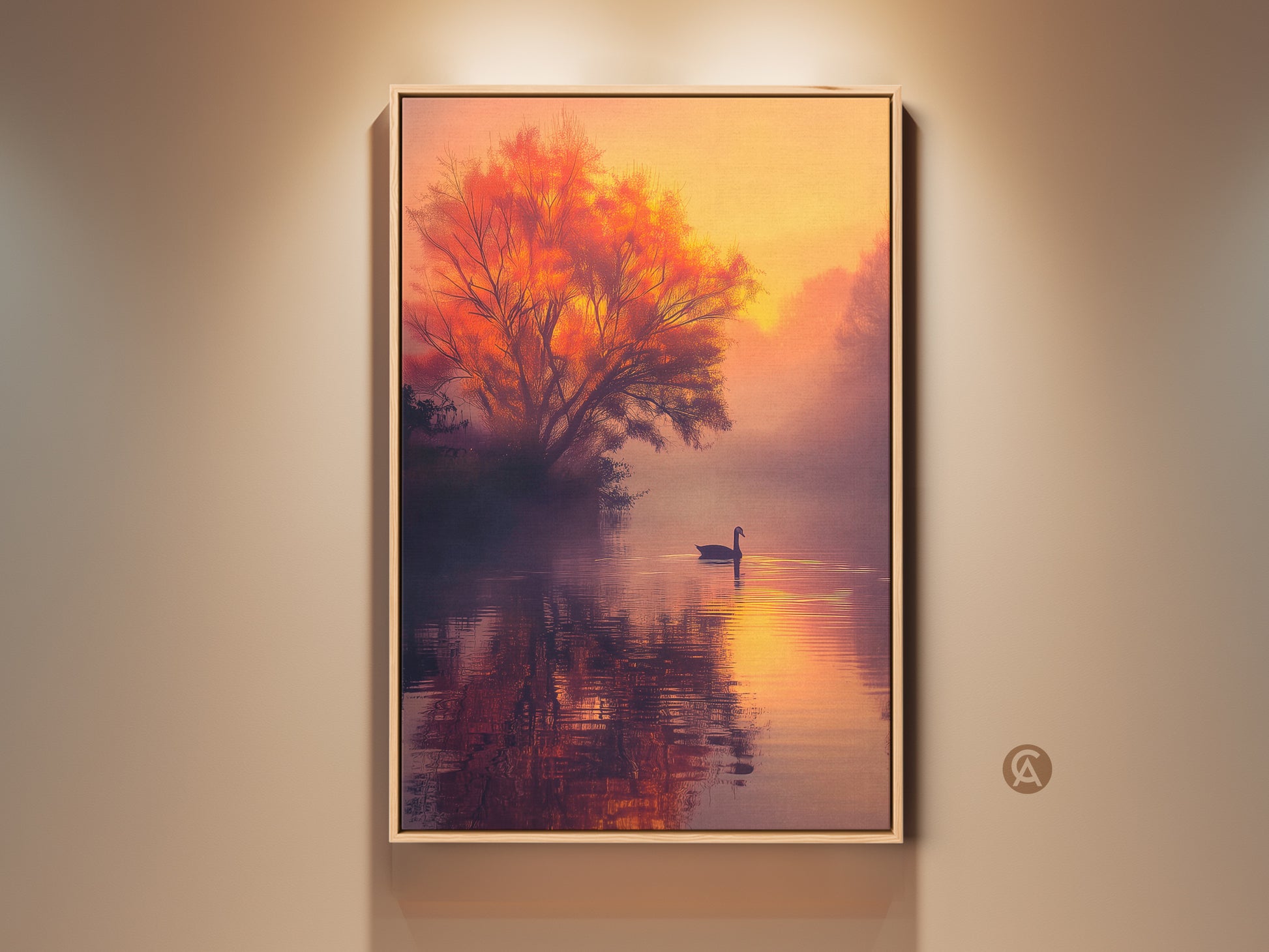This artwork shows a serene lake at sunset. A lone swan glides across the water. The warm light bathes a fiery tree in the background. This framed canvas art brings a peaceful atmosphere to any room. Shop now to add a touch of nature's beauty to your home decor.