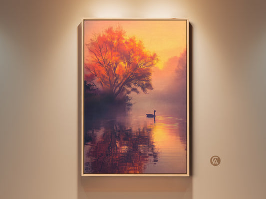 This artwork shows a serene lake at sunset. A lone swan glides across the water. The warm light bathes a fiery tree in the background. This framed canvas art brings a peaceful atmosphere to any room. Shop now to add a touch of nature's beauty to your home decor.