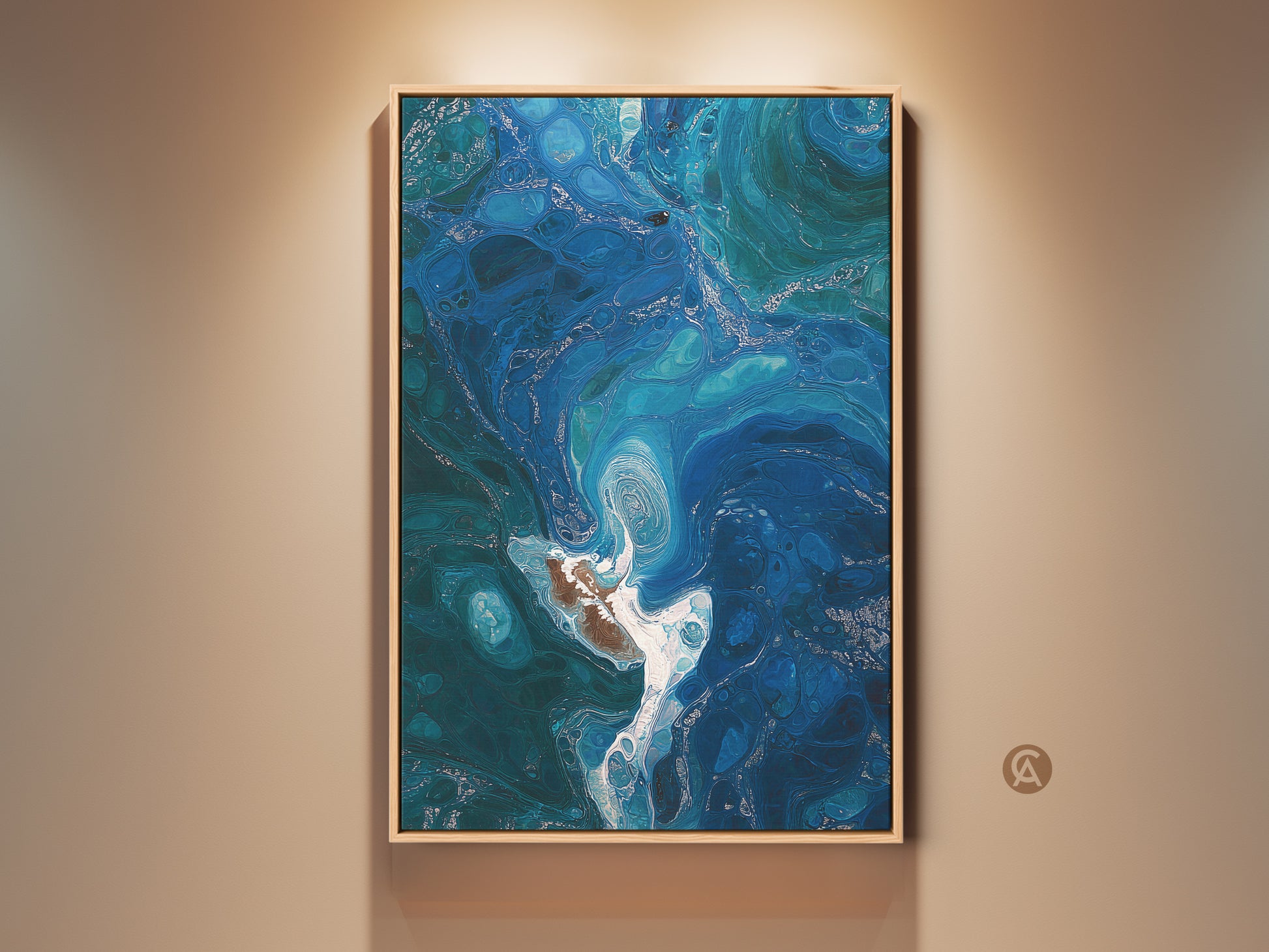 Deep blue and teal fluid art canvas print adorns a beige wall. The contemporary coastal decor features abstract ocean swirls. The framed artwork adds modern elegance to the room. This piece is perfect as contemporary home decor or as a thoughtful housewarming gift.