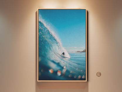 Stunning surfer artwork. The surfer rides a large turquoise wave under a clear blue sky. It's framed in natural wood adding warmth. Perfect coastal decor for ocean art lovers.