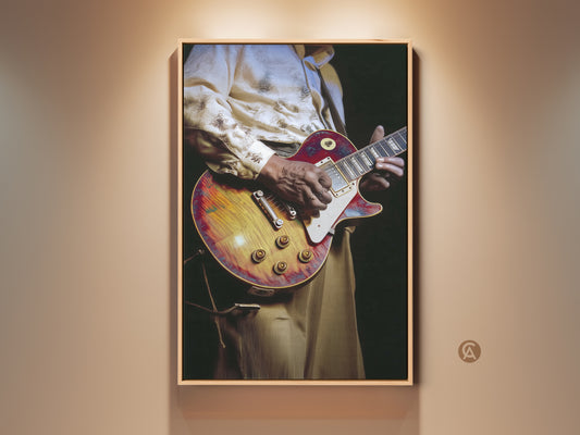 Vintage guitarist canvas art for music lovers. Eclectic red and yellow artwork adds flair to any studio. A perfect gift for musicians embodying blues music. It captures the essence of a musician playing guitar. This retro rock and roll art brings a touch of musical history. Ideal for a man cave or home bar. Anniversary or birthday gift for guitar player.