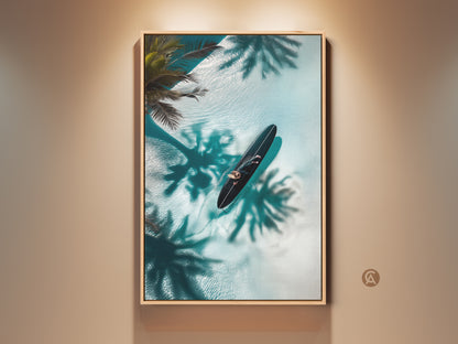 Elevate your space with this framed wall art. The artwork features a person on a surfboard in crystal-clear water. Palm tree shadows dance around adding a touch of tropical paradise. This serene piece brings a sense of calm to any room. Perfect for coastal art lovers seeking a unique statement piece.