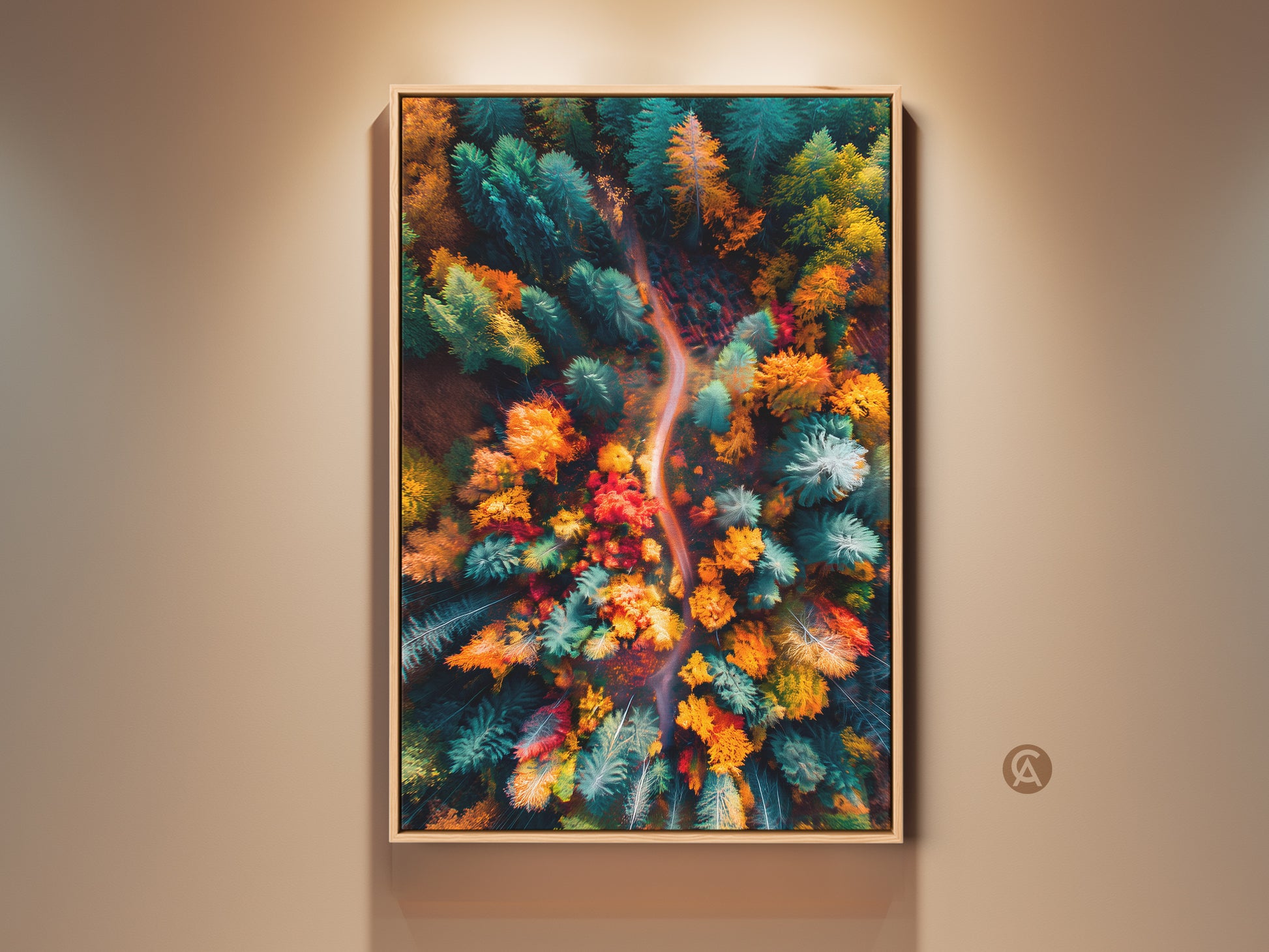 Framed aerial forest art print. This artwork features a vibrant autumn forest scene from above. A winding path cuts through the colorful trees. The print is displayed in a natural wood frame. It's a stunning piece for nature lovers.