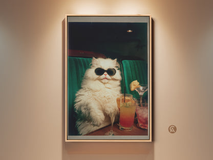 Framed artwork featuring a fluffy white cat wearing sunglasses. The cool cat sits inside a green booth with several cocktails. A unique piece of wall art for cat and cocktail lovers. This art is a conversation starter.