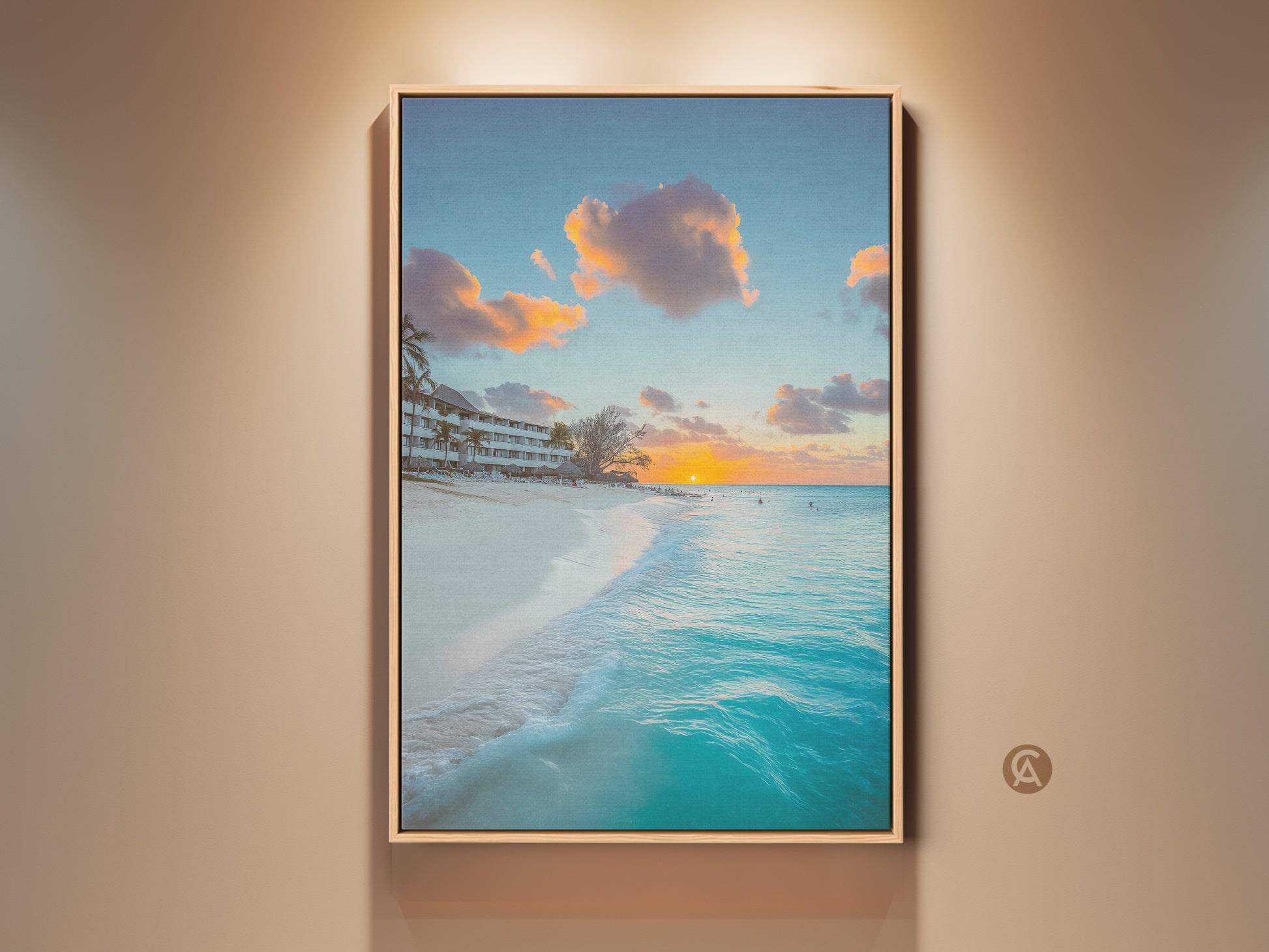 Turquoise ocean sunset canvas print displayed in a living room. Coastal beach wall art brings a tropical landscape to your home. Luxury home decor art offers a gift for beach lovers. Blue ocean waves on canvas create an island paradise. Seaside sunset photography offers a travel destination art print.