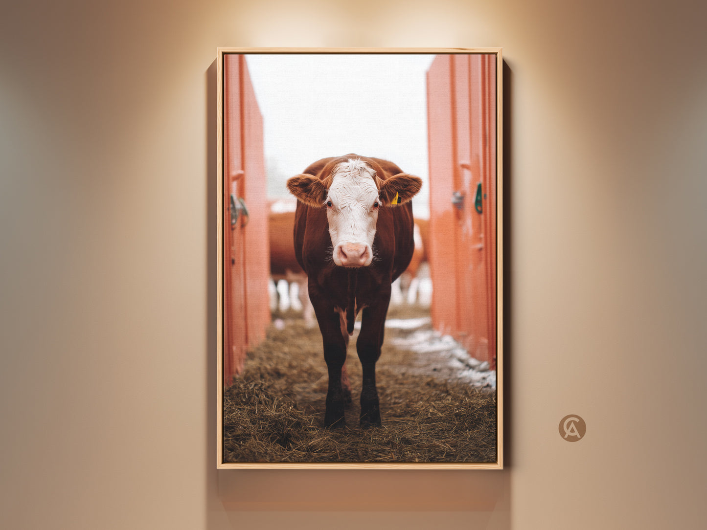 Close-up farmhouse cow art print on wall. A brown and white animal adds country charm to any home decor. Perfect as a housewarming gift for rustic kitchens and living rooms.