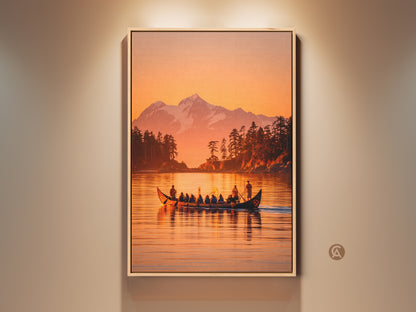 Framed canvas artwork featuring a pacific northwest canoe scene. The artwork shows a canoe with people on a lake. A snow-capped mountain and forest are in the background. Warm sunset colors fill the sky. This framed wall art brings nature indoors.