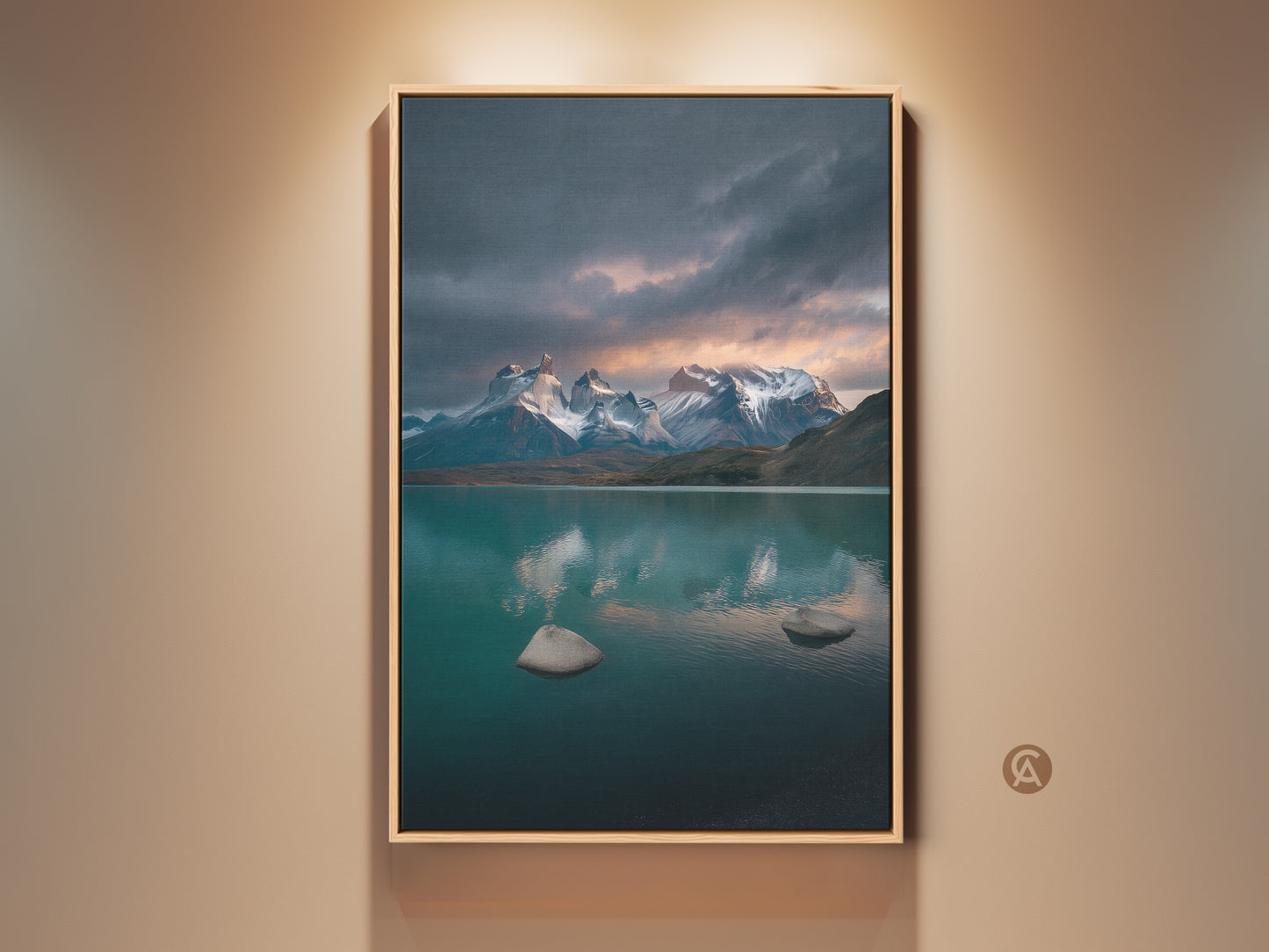 Contemporary lake and mountain canvas print in a wood frame. This scenic wall artwork features deep blues and teals. Ideal for outdoor lovers and modern home decor. The calm lake photography captures a serene nature scene. This fine art landscape print adds elegance to any room. Perfect as a housewarming gift.