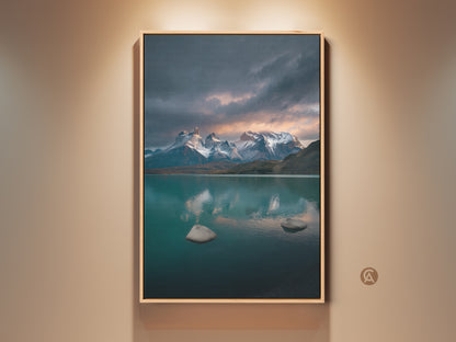 Contemporary lake and mountain canvas print in a wood frame. This scenic wall artwork features deep blues and teals. Ideal for outdoor lovers and modern home decor. The calm lake photography captures a serene nature scene. This fine art landscape print adds elegance to any room. Perfect as a housewarming gift.