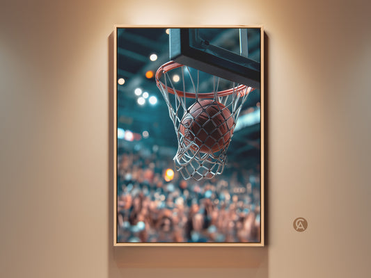 Basketball Art Framed in a modern style. This is a close-up shot of a basketball going through the net. The crowd is blurred in the background. This basketball art is perfect for sports fans. Buy this framed art to show your love for the game.