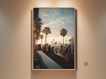 A framed canvas artwork capturing a lively bar scene at sunset. Palm trees line the horizon under a soft sky. Patrons gather enjoying the vibrant atmosphere. Perfect wall art to bring a touch of coastal energy to any space.