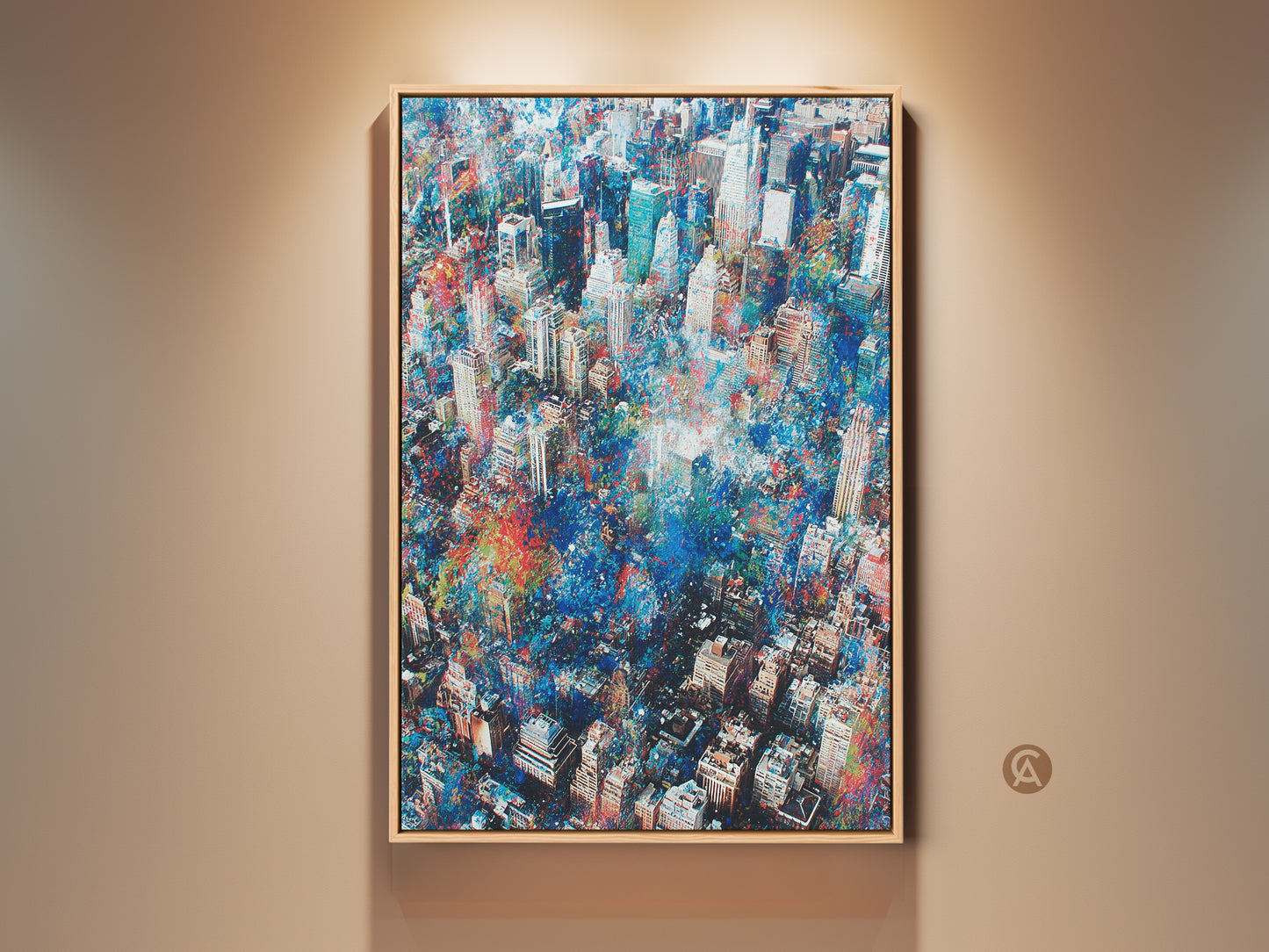 Framed aerial cityscape artwork. This painting captures the energy of the city. The artwork features blues reds and whites. The frame is made of light oak wood. It adds a touch of warmth to the modern piece.