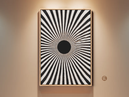 A striking abstract geometric wall art print. This mid-century sunburst canvas features a bold black and white minimalist design. The radial sunburst makes a great entry hall art piece. Consider this monochrome sunburst print a thoughtful housewarming gift. The artwork gives a sophisticated look to modern home decor.