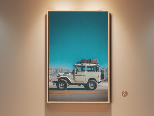 Vintage SUV wall art in a loft setting. This retro mountain landscape canvas print features a sky blue backdrop. The teal and off-white tones create adventure photography. Ideal industrial decor.