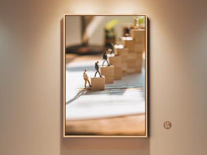Conceptual business wall art shows miniature figures climbing wooden blocks. This motivational decor in brown blue and yellow is ideal for office spaces. A unique art print symbolizing progress and achievement. This is a perfect gift for ambitious professionals seeking inspiration and career growth.