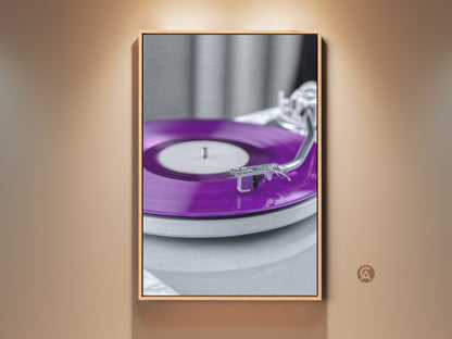Mid-Century Modern turntable art print on display. The artwork features a close-up of a purple vinyl record. It's a retro music wall decor piece. This adds a touch of vintage charm. It's perfect as a gift for music enthusiasts.