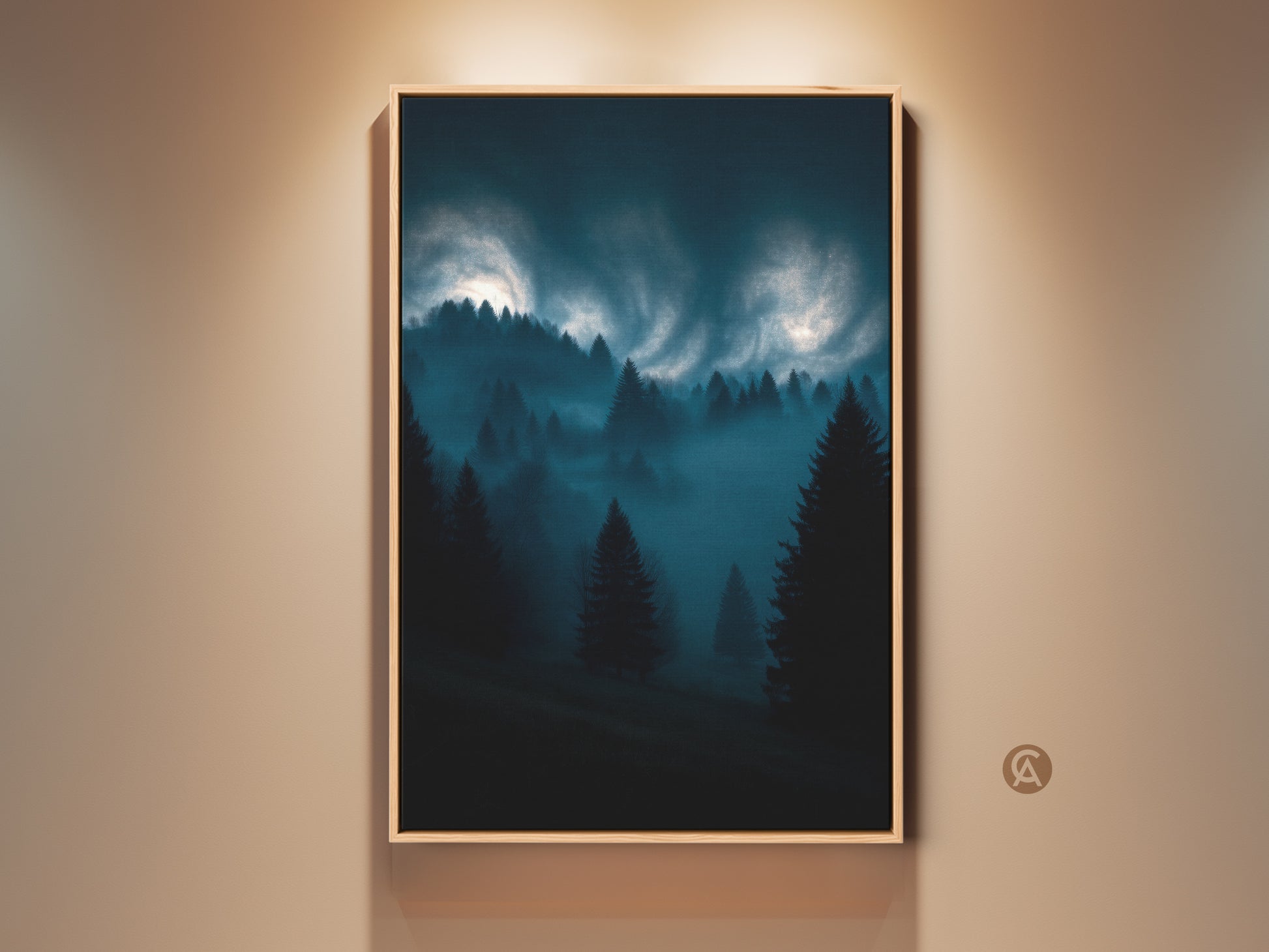 Modern midnight blue forest artwork hangs on a beige wall. The misty pine trees art is a captivating canvas print. Dark teal nature landscape adds serene decor to a home office.