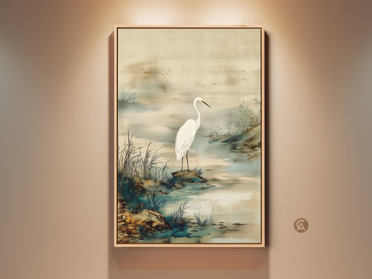 Framed Egret bird canvas art in a room setting. This Japandi style wall art is a minimalist ink wash landscape print. Perfect beige and green wall decor for calm home decor. It brings nature indoors.