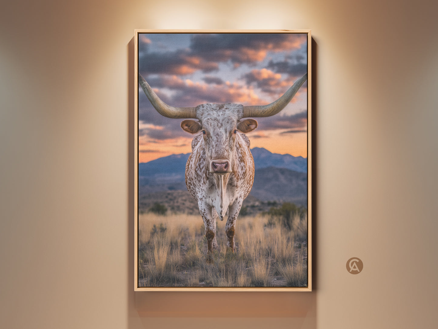 Longhorn steer canvas art brings rustic western charm to your home. The tan animal portrait features a mountain sunset background. This farmhouse landscape art is perfect for bedroom wall decor or as a cowboy gift idea.