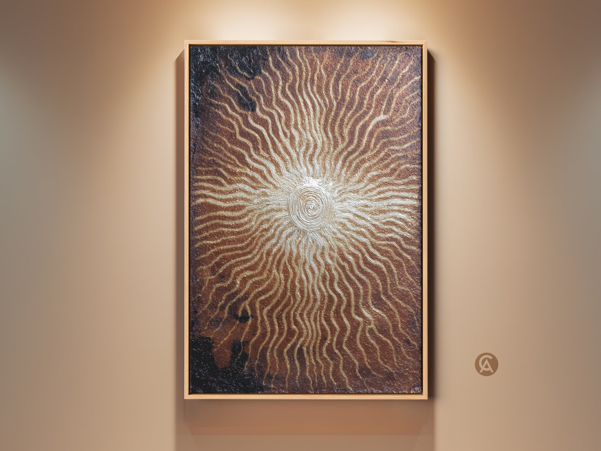 Bronze gold sunburst canvas print. Abstract spiral wall artwork adds an eclectic touch to your entryway. The textured metallic finish complements many home decor styles. It's a luxurious modern piece and an ideal housewarming gift for art enthusiasts.