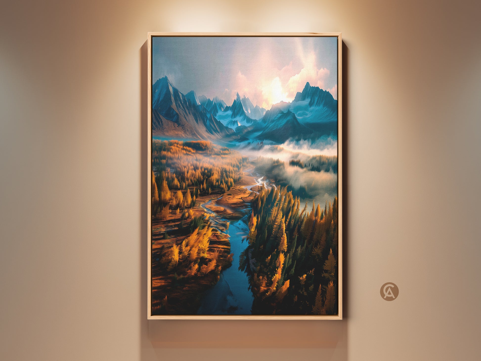 Framed landscape artwork featuring mountains a river and golden trees. The art is displayed in a wooden frame on a neutral wall. This wall art brings nature's beauty indoors. Perfect for adding a touch of serenity to any room. Buy this framed artwork to elevate your space.