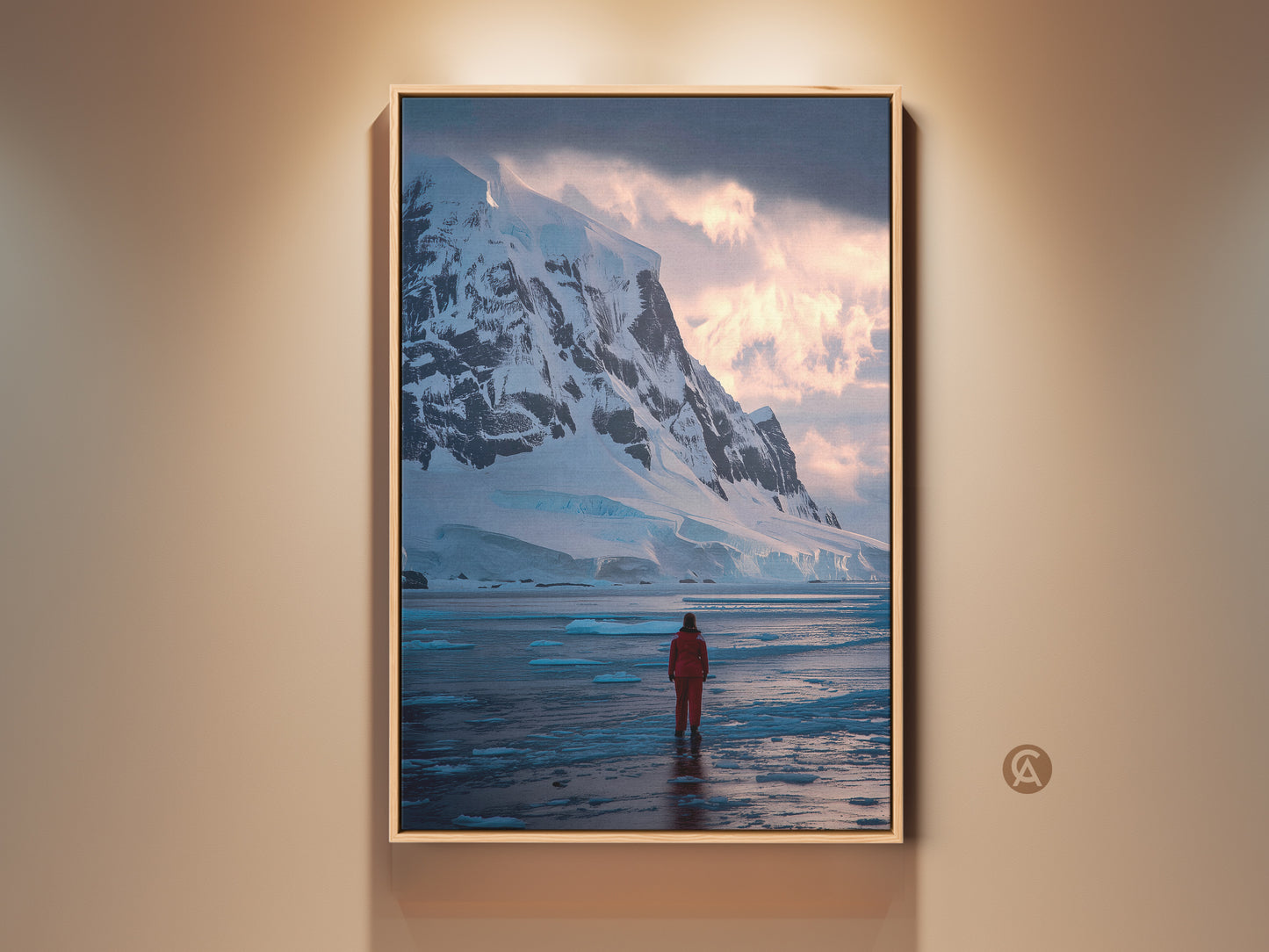 Antarctic canvas print featuring a lone explorer in a red suit. The wall art showcases snowy mountains and icy waters. Modern ice blue home decor brings the grandeur of nature indoors perfect for bedroom or office spaces.