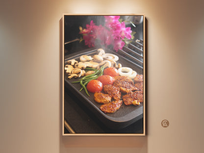 Framed contemporary kitchen wall art features grilling food. This canvas print adds modern home decor for food lovers. It shows a housewarming gift idea with vibrant colors. Realistic cooking art displays still life food prints like mushrooms and tomatoes. Seasoned meat on canvas creates culinary art for the home.