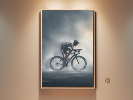 Modern art print featuring a road cyclist in dynamic motion. This charcoal silver cycling decor is showcased in a frame. Ideal office or gym canvas art. The artwork captures the intensity of the sport. A perfect gift for a cycling enthusiast man cave or professional office space.