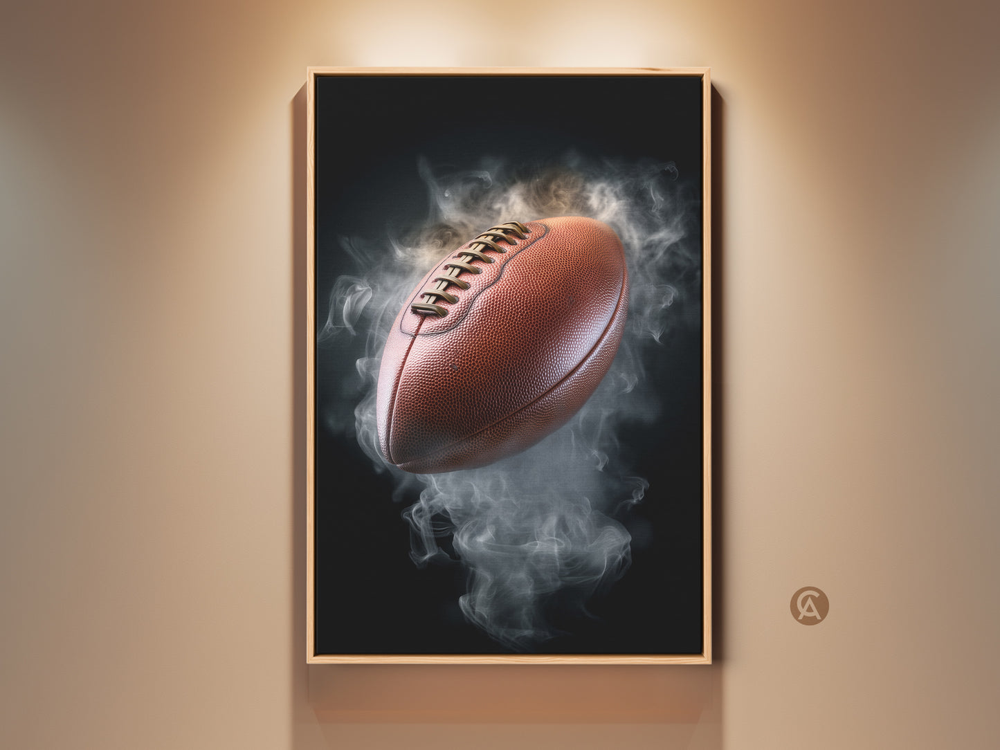 Framed smoke football canvas art print displayed on a wall. This modern office artwork features a brown football emerging from gray smoke. Perfect sports fan gift for a man cave or professional office decor.