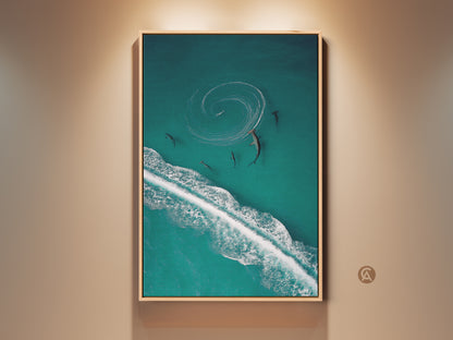 Elevate your space with this framed turquoise ocean canvas art. This aerial shark and wave wildlife print brings coastal deep blue hues to your wall decor. Perfect for adding a touch of marine life artwork to your home. A captivating piece for ocean lovers seeking unique wall art.