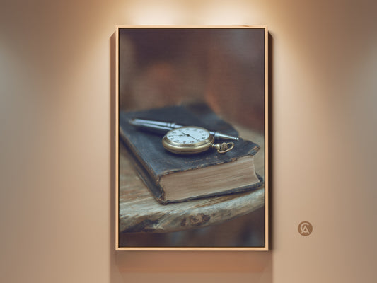 Sepia Gold Wall Art Canvas Print featuring a Vintage Book and Pocket Watch. This traditional artwork is ideal for office decor or a book lover's gift. The classic timepiece art adds refined history to any room. Perfect for a gentleman's study or literary-themed decor. Enhance your desk area with this historical art piece.