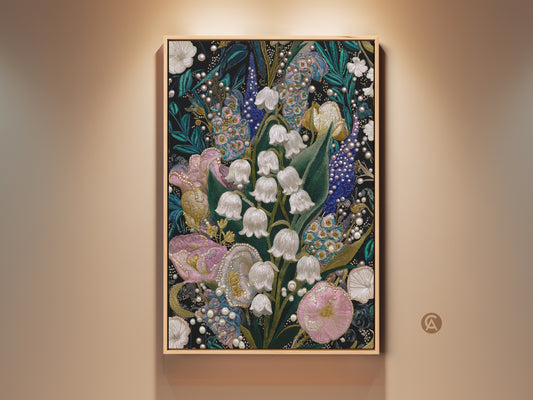 Framed Lily of the Valley & Tulip Embroidery Art Print on a beige wall. The artwork features a textured nature print with pink white and teal floral decor. This botanical wall art adds spring charm to any maximalist home decor.