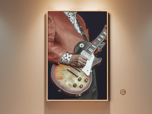 Vintage Electric Guitar Canvas Art displayed in a warm-toned room. The retro rock music wall decor features brown and red hues. A mid-century modern office gift idea for the musician. The classic guitar artwork adds a musical vibe to any space. Perfect gift for electric guitar lover.