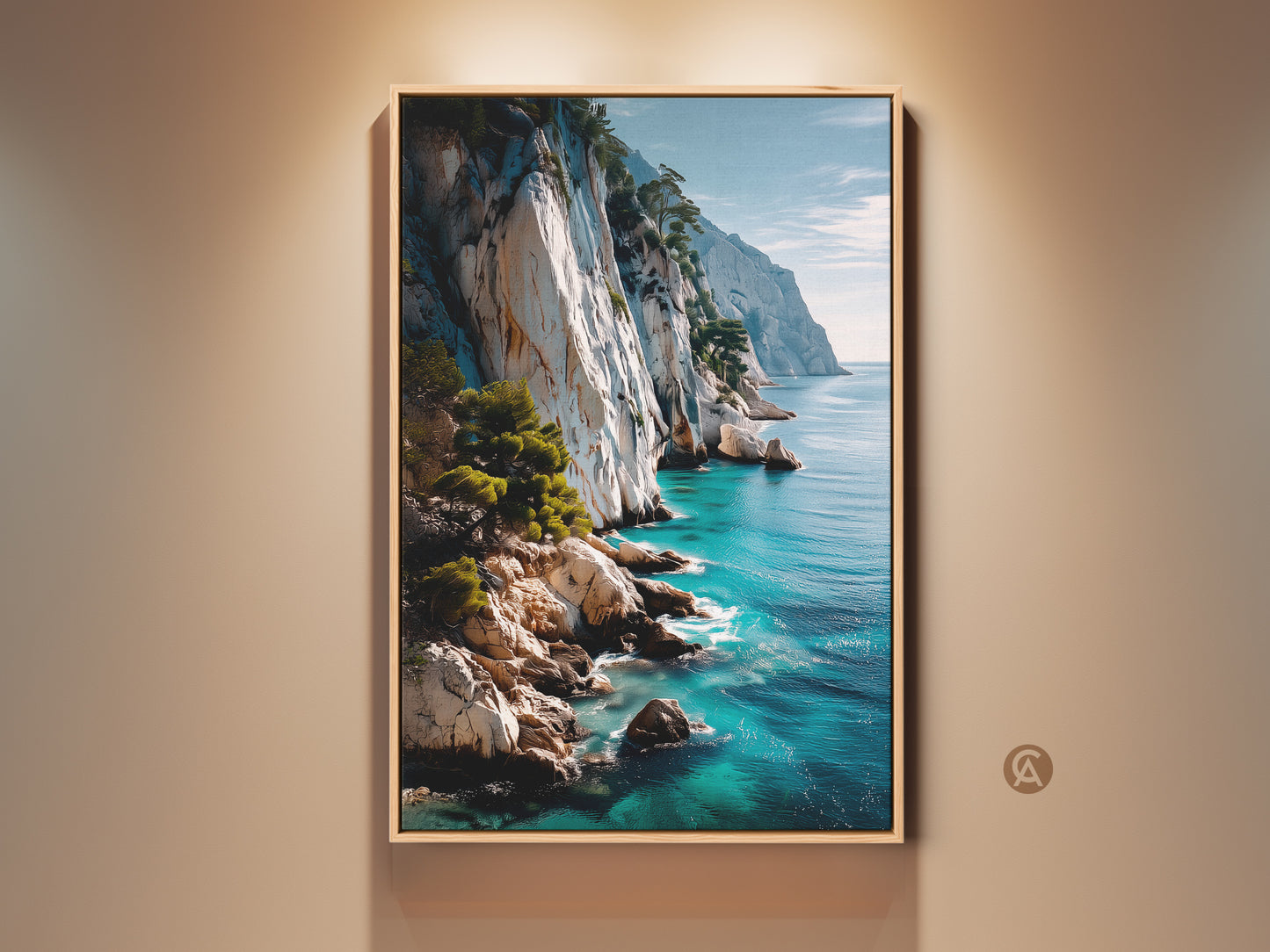 Framed photorealistic coastal cliff canvas print. This nature landscape features a turquoise blue seascape. The Mediterranean style artwork is displayed in a residential setting. The ocean waves and cliffs create a tranquil atmosphere. Perfect wall decor for beach lovers and coastal homes.