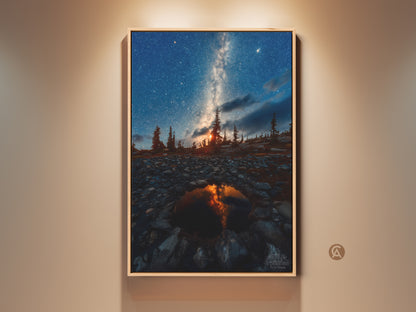 Rustic landscape canvas print featuring the Milky Way over pine trees. This astrophotography wall art shows a dark sky decor. It captures a serene night scene with deep blue and orange hues. Ideal astronomy gift for him or nature lovers artwork. Perfect housewarming gift print for residential wall art.