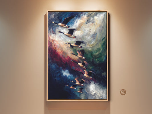 Framed abstract geese canvas art hangs on a neutral wall. This indigo and blue sky wildlife print showcases a flock of birds in flight. A perfect bird watcher gift for contemporary wall art.