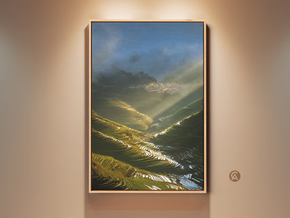 Framed Photorealistic Terrace Fields Canvas Print featuring golden sunbeams. A village scene and blue green landscape art enhance modern farmhouse wall decor. This cinematic artwork brings tranquility to any room.