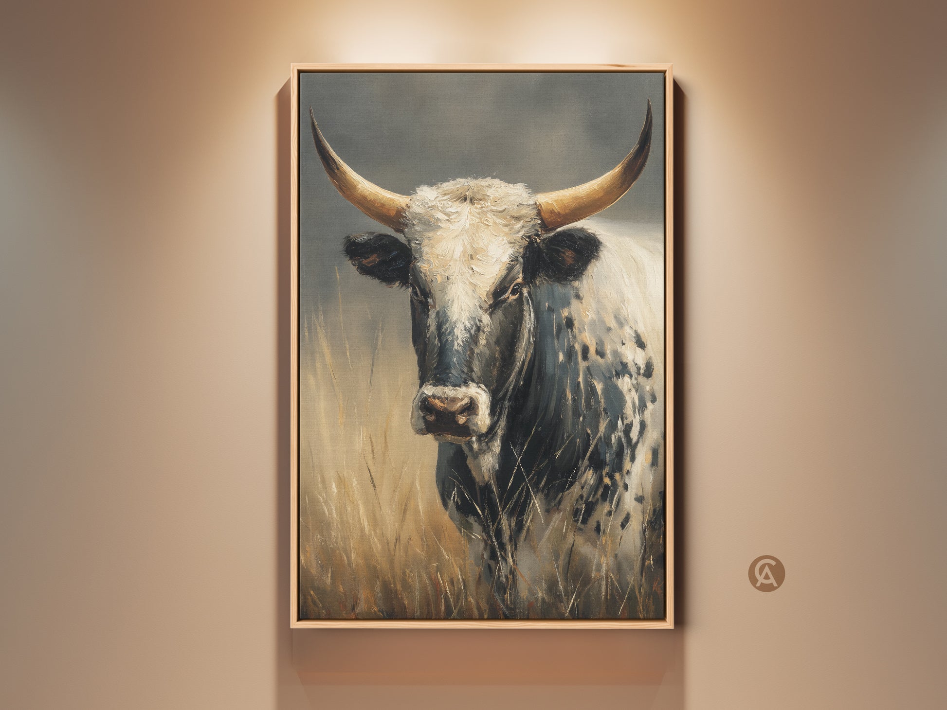 Gallery display of Longhorn Cow artwork. This canvas wall art features a black and white longhorn cow. It has a rustic animal print style. Perfect for farmhouse or country home decor. The artwork is displayed in a natural wood frame.